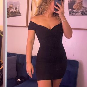 Laura’s boutique! Size small! Black dress with self tie!